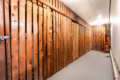 A room under construction with wooden studs on the walls.