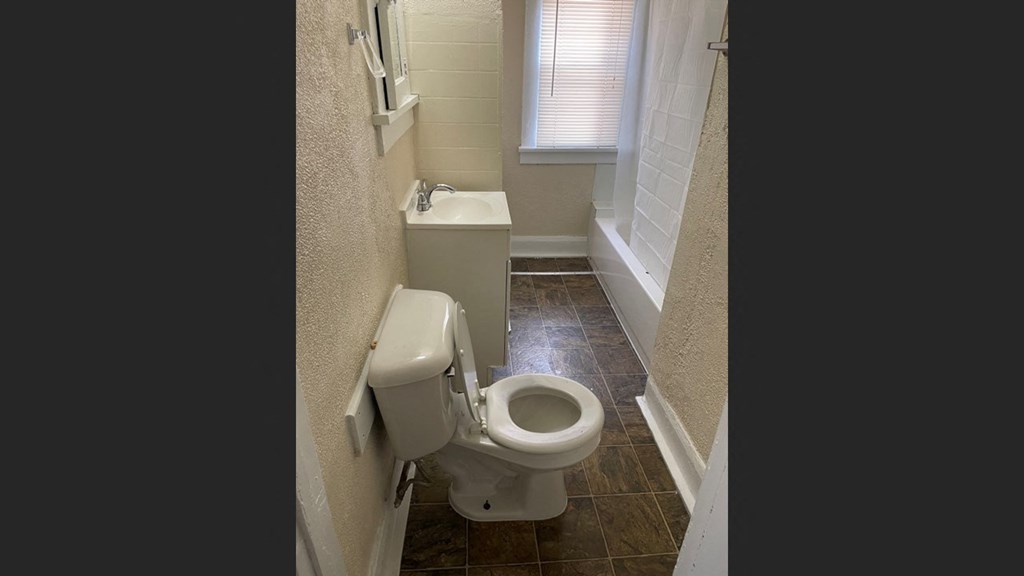 a small bathroom with a toilet and a sink