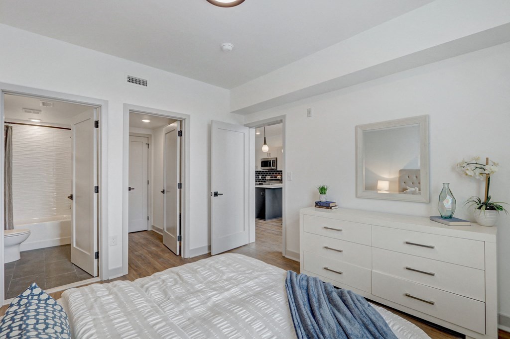 a bedroom with a bed and a closet