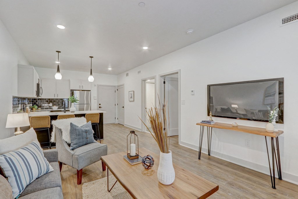 a living room with a couch and a tv