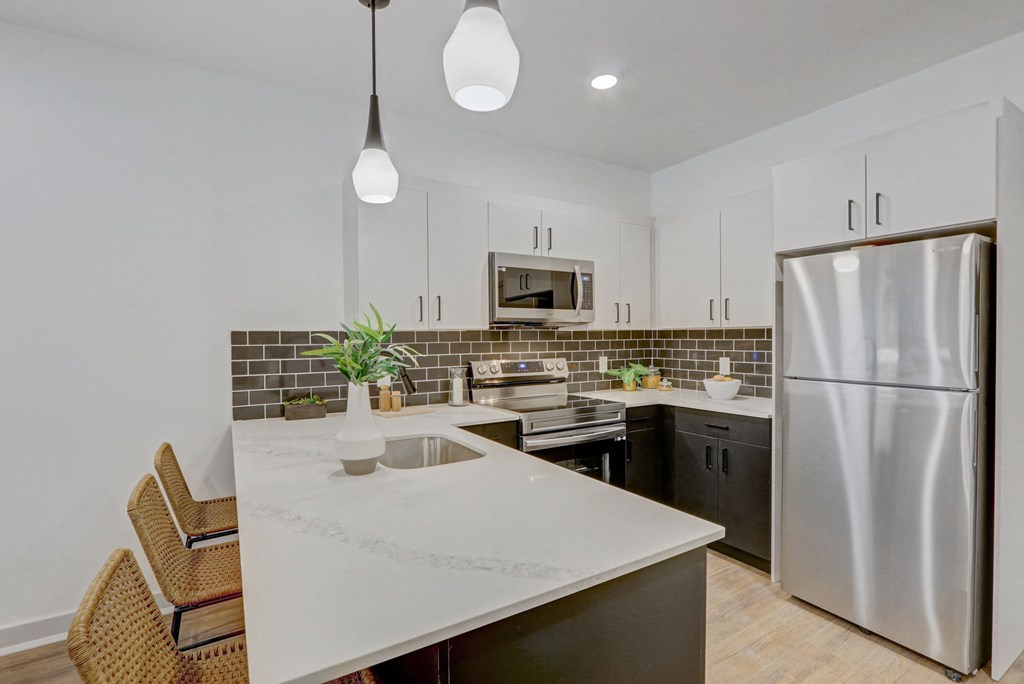 the preserve at ballantyne commons apartment kitchen and stainless steel refrigerator