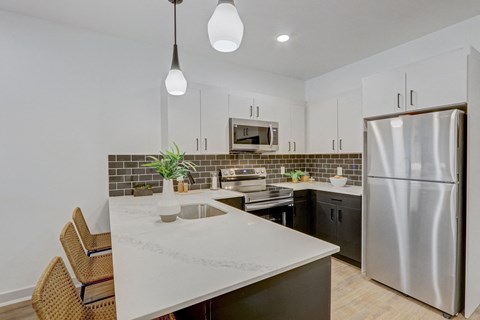 the preserve at ballantyne commons apartment kitchen and stainless steel refrigerator