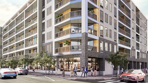 A modern apartment building with the name "Rosewood" on the front.