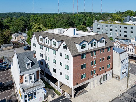 a view of a building from the roof of another building