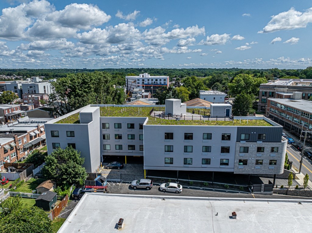 a green roof on a building in a city