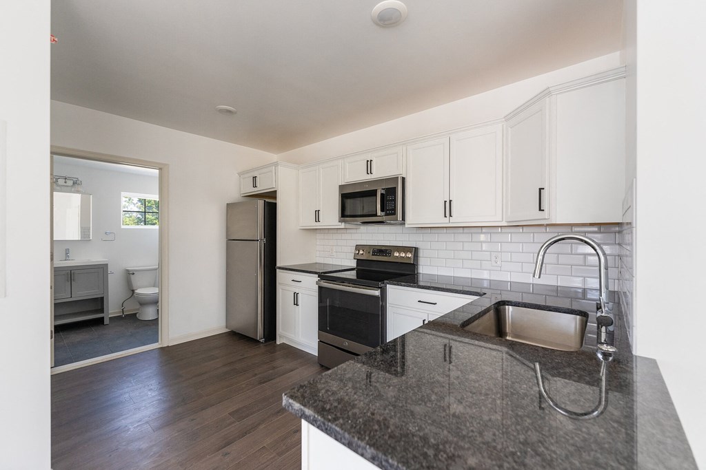 Kitchen with Granite Countertops and Stainless Steel Appliances