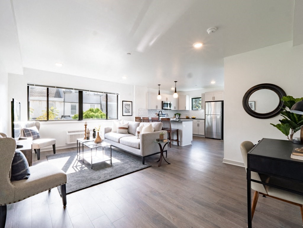 a living room with a couch and a table