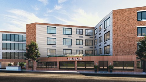 A modern building with a sign that says "Commercial" on it.