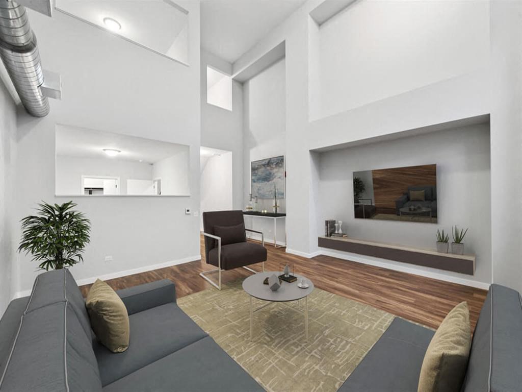 a living room with a couch and a table