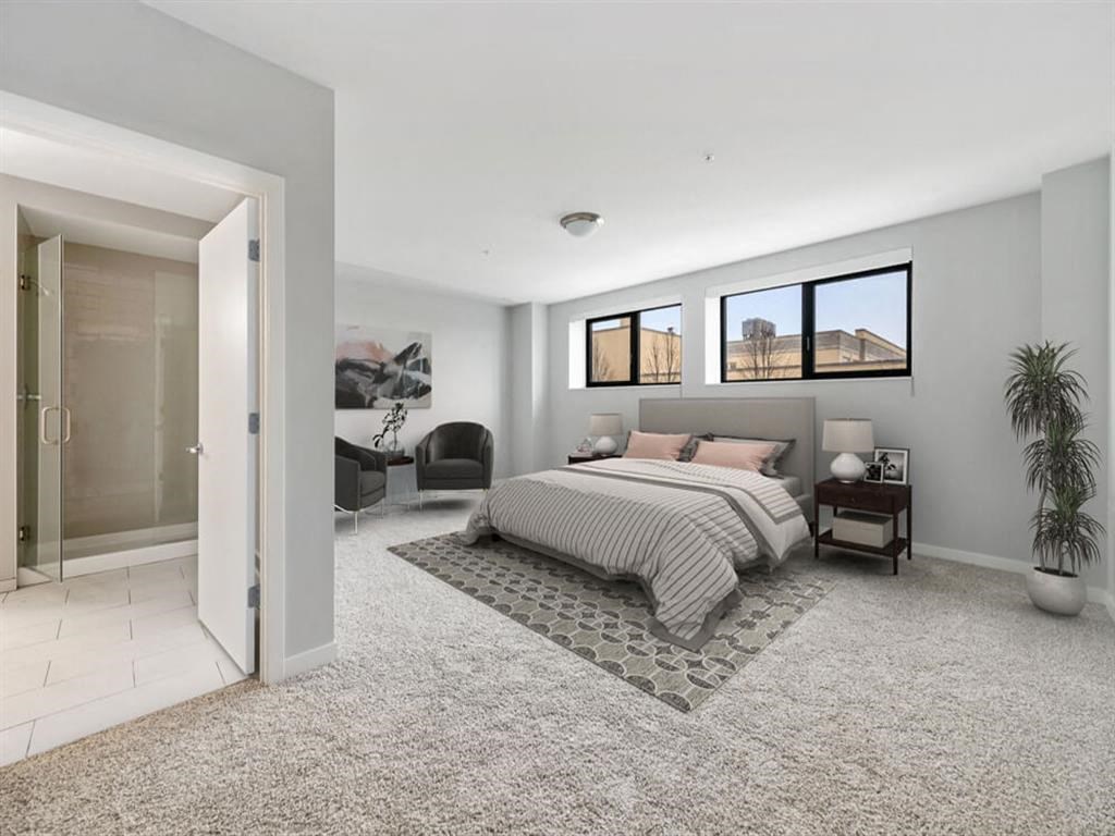 a bedroom with a bed and a closet