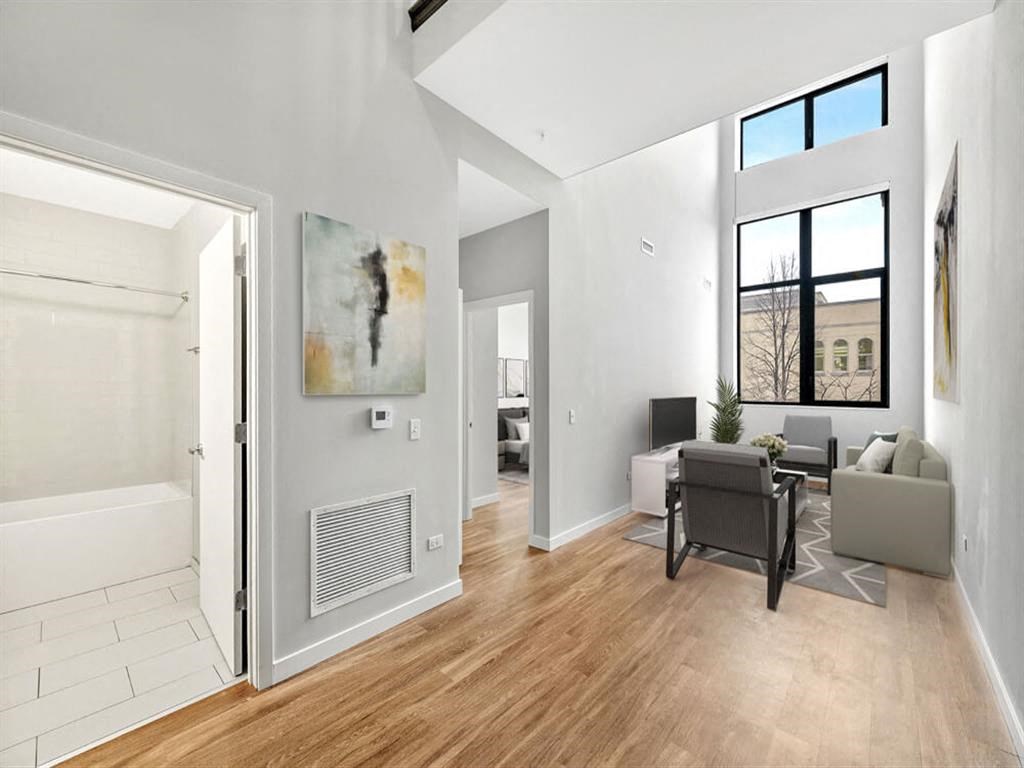 a living room with a couch and a table