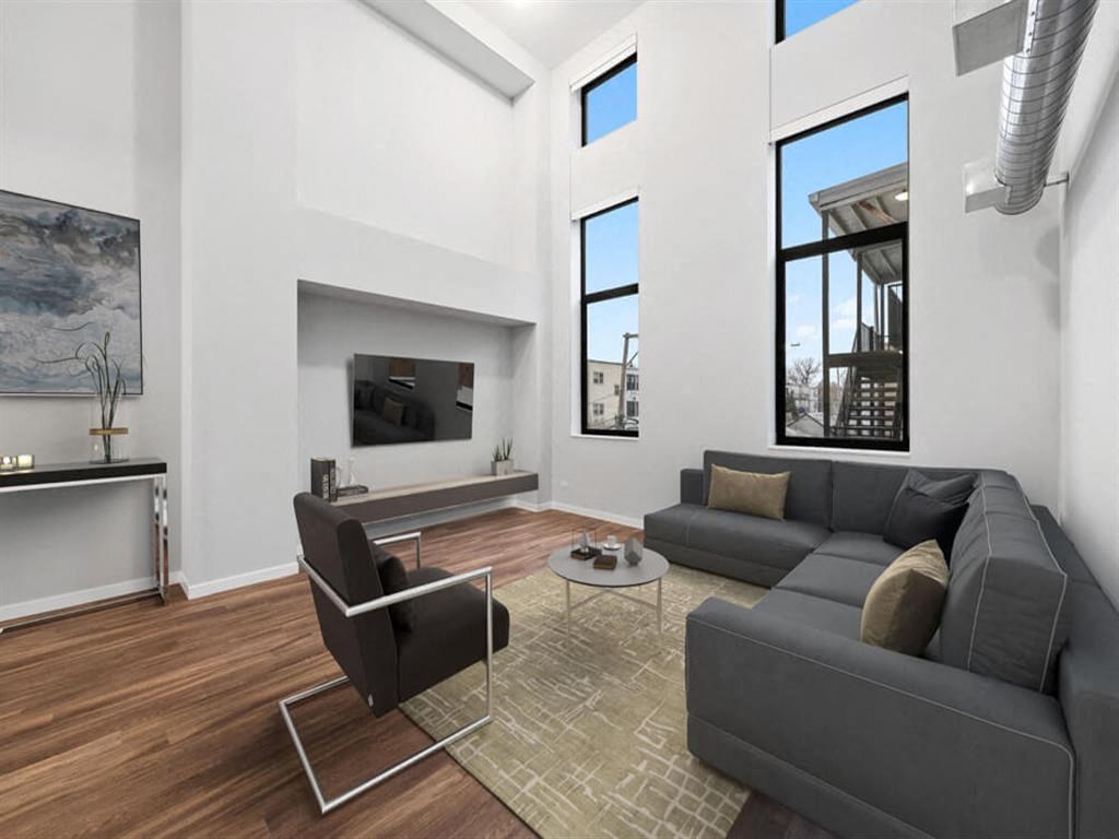 a living room with a couch and a table