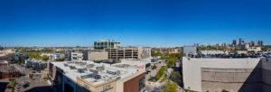 a view of the city from the roof of a building