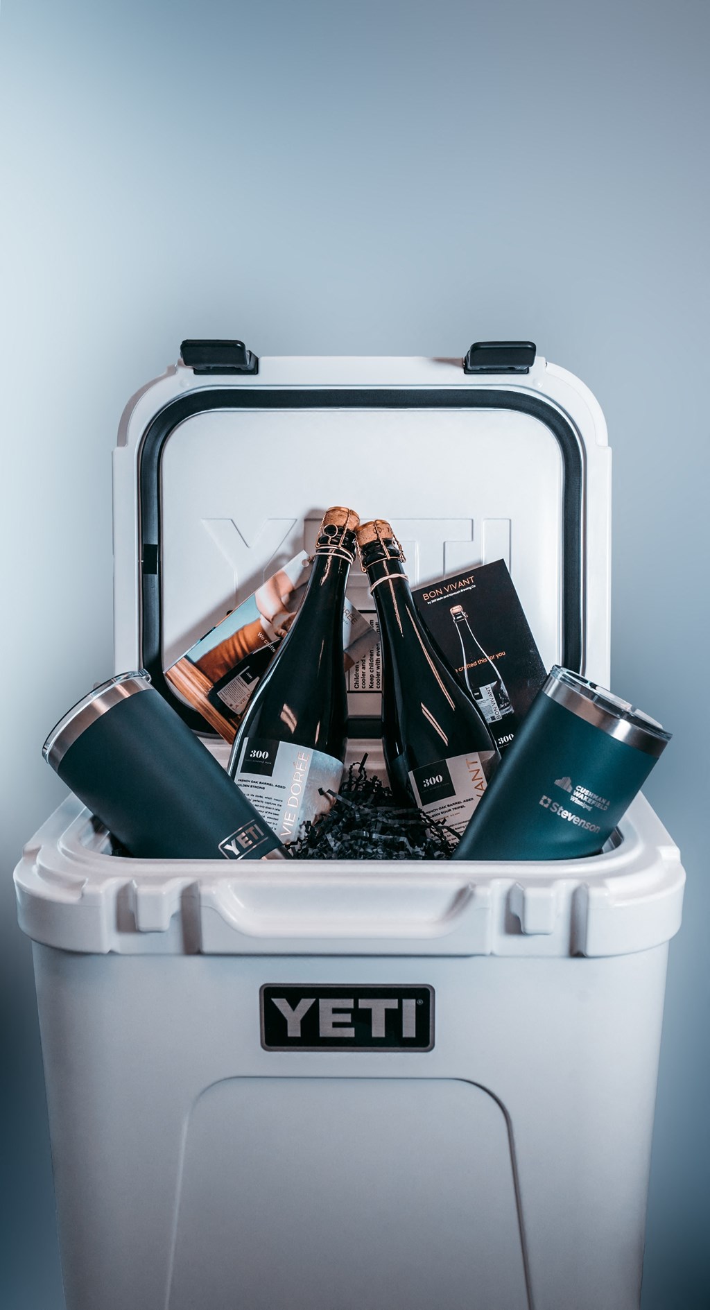 an image of a yeti cooler with two bottles of wine in it