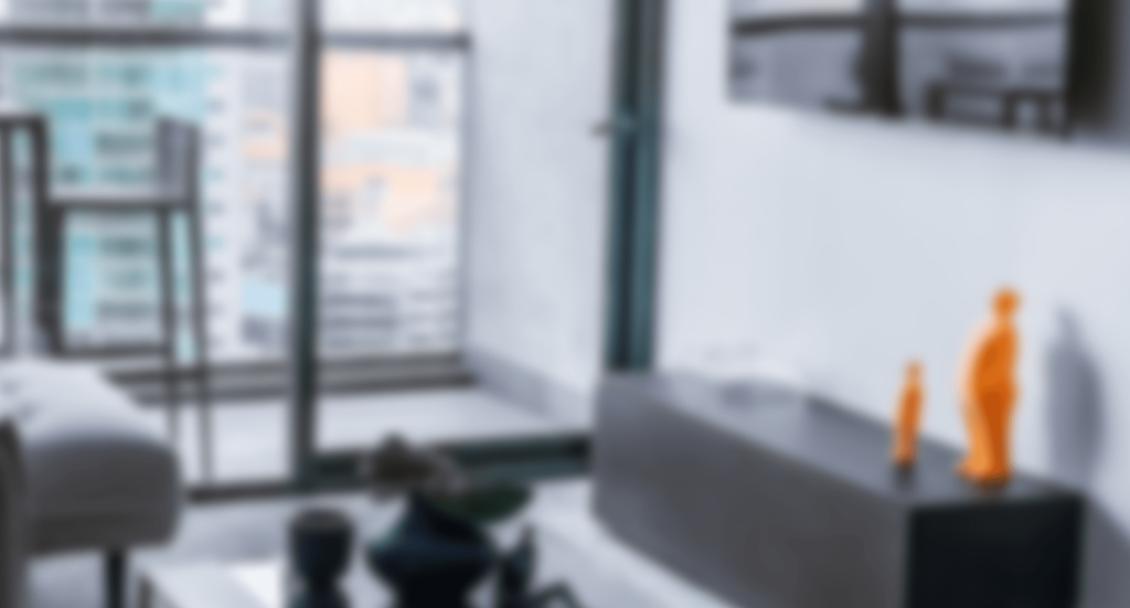 a living room filled with furniture and a large window