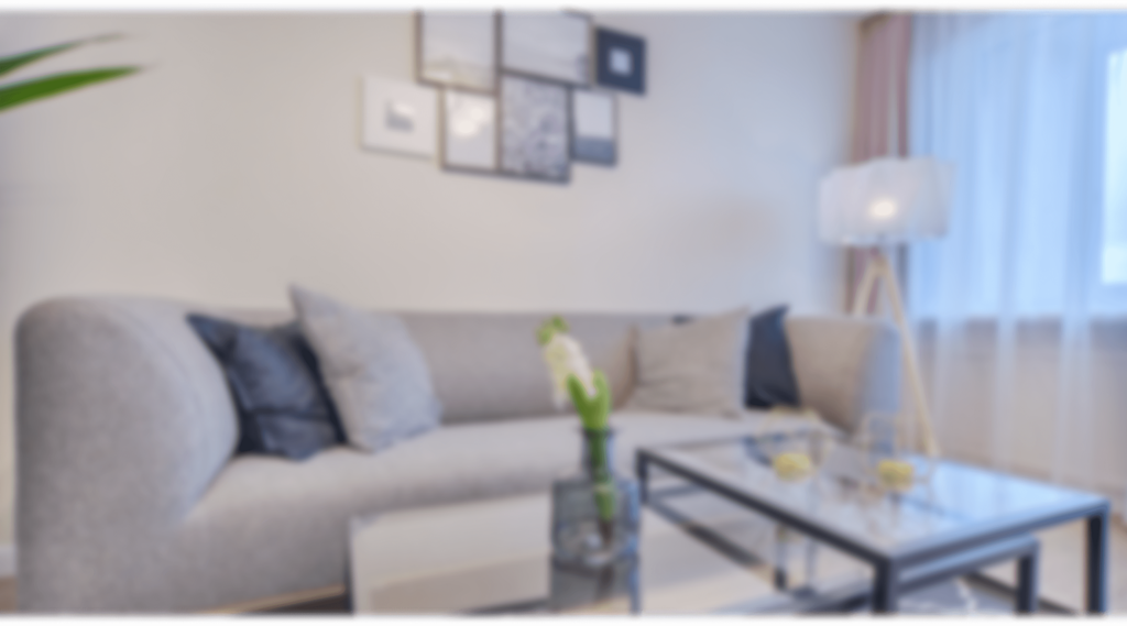 a living room with a couch and a coffee table