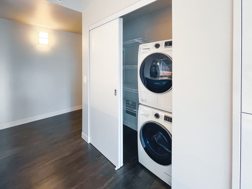 a laundry room with a washer and dryer in a closet