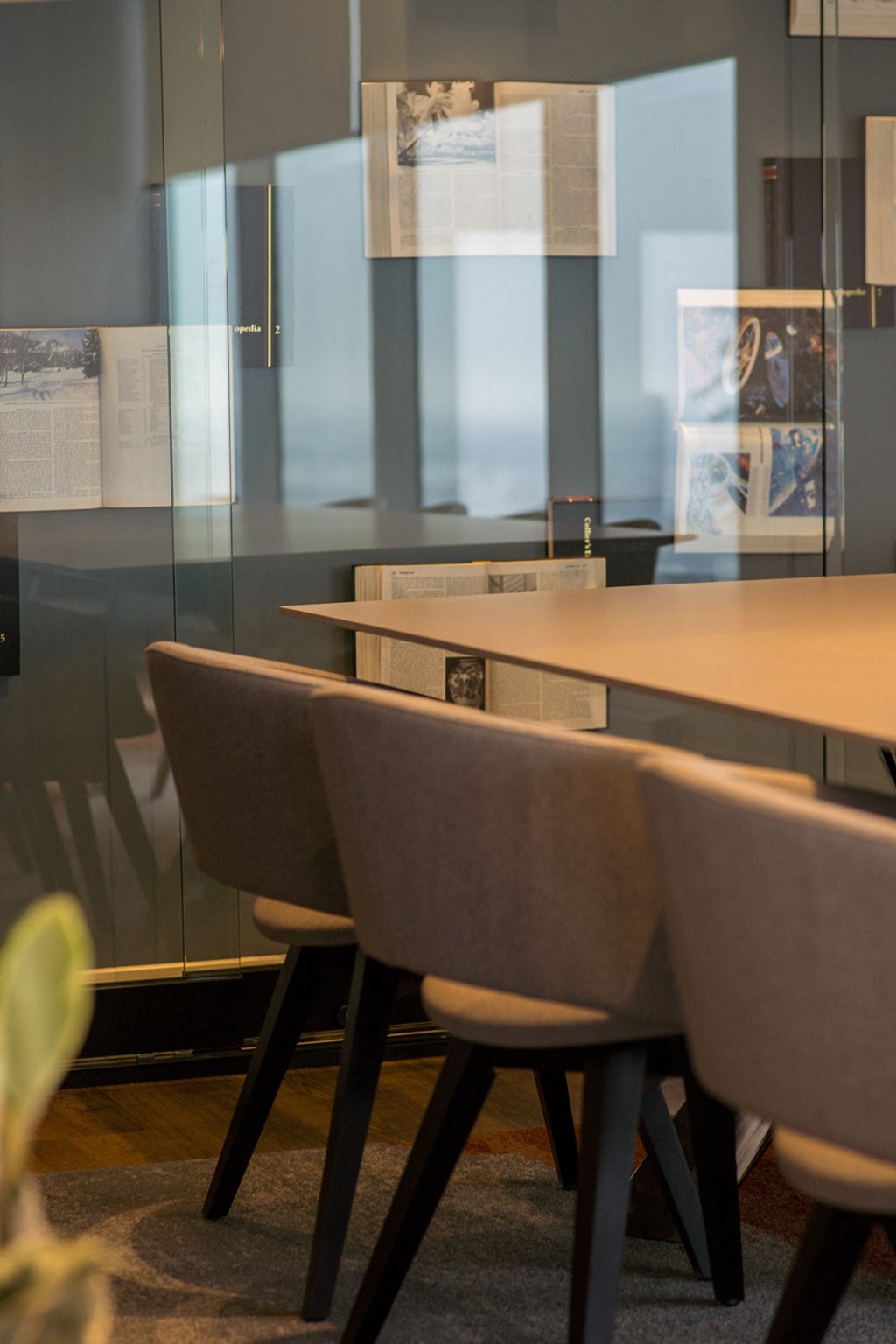 a group of tables and chairs in a room