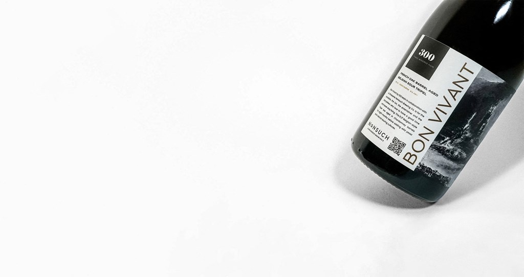 a black bottle of wine on a white background