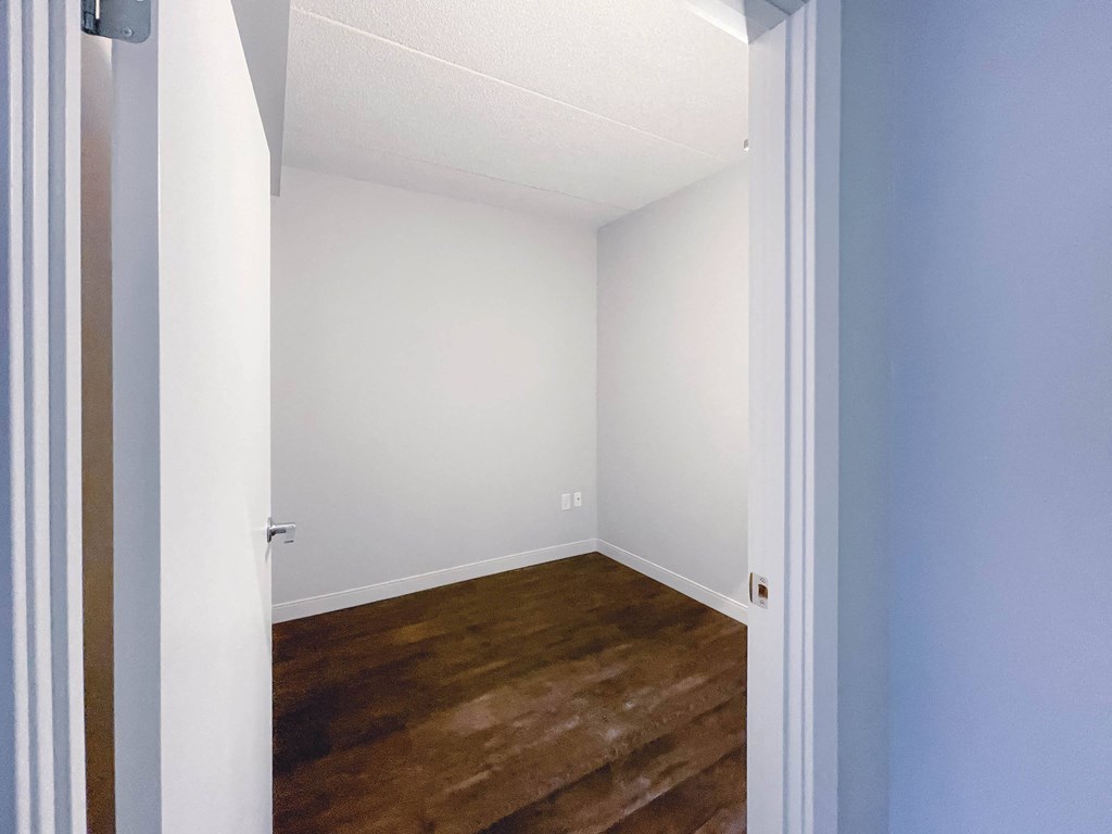 a bedroom in a 555 waverly unit