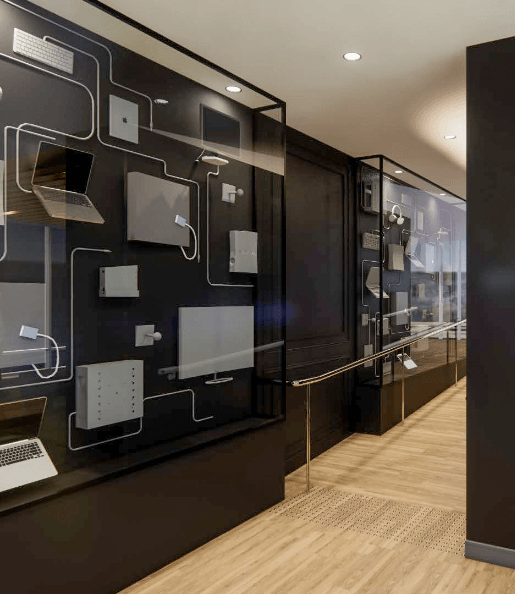 a glass wall with various devices on it in a room