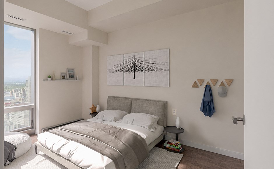 a bedroom with a bed and a window