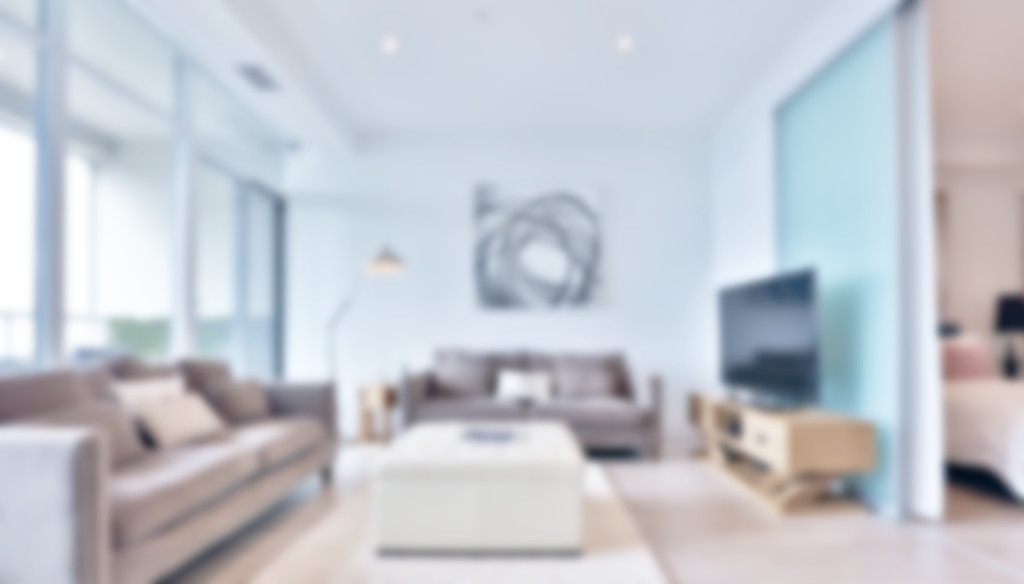 a living room with a couch and a television