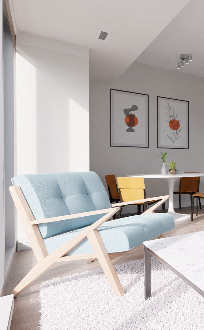 a living room with a blue couch and a table