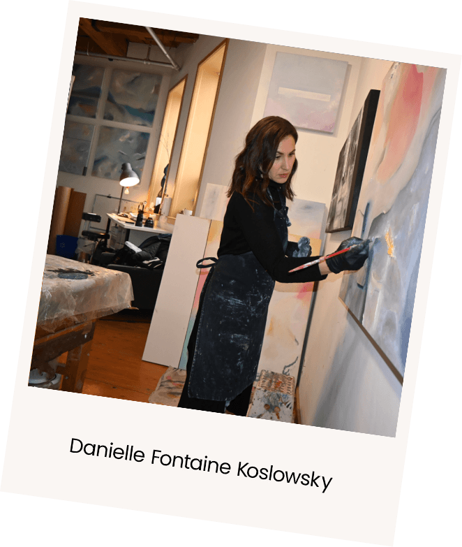 person working on a painting in her apartment