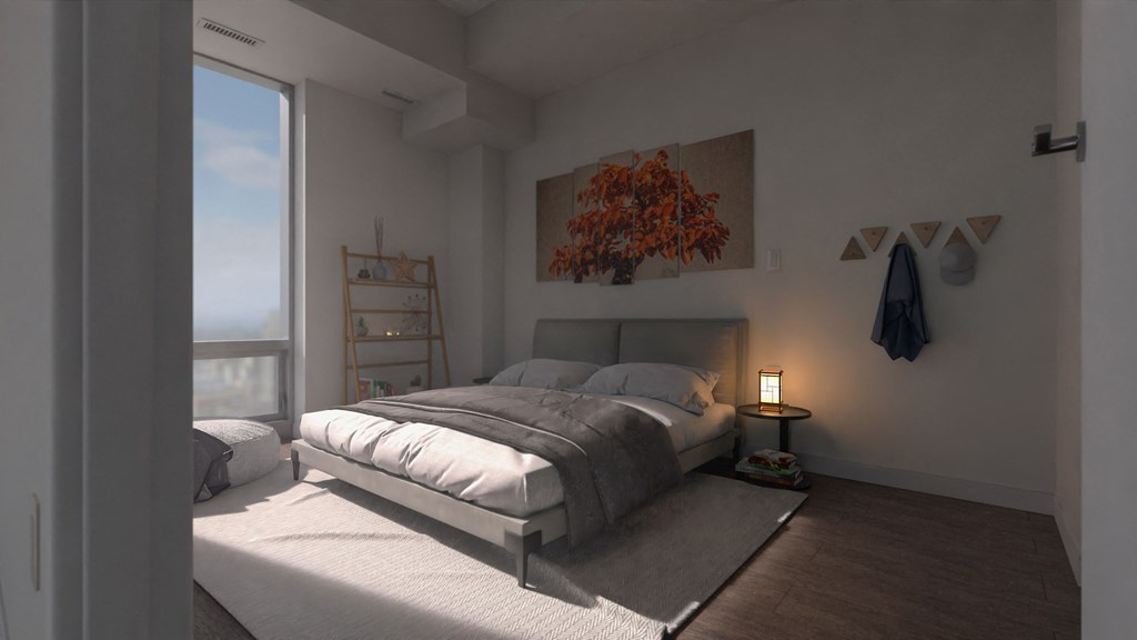 a bedroom with a bed and a window