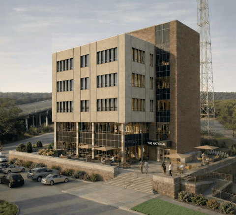 The National building is a large, modern structure with a flat roof and a glass facade.
