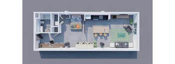 A top-down view of a small apartment layout with a kitchen, living room, and bedroom.