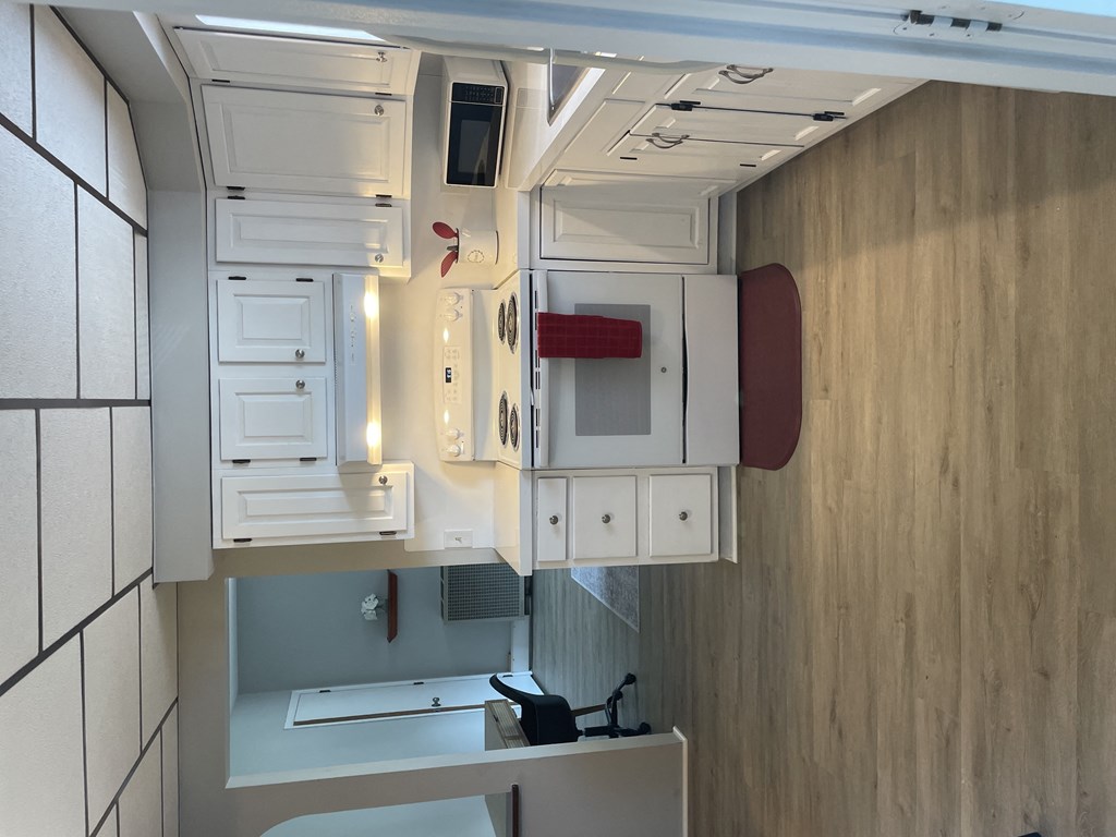 an overhead view of a small room with a bathroom and a sink