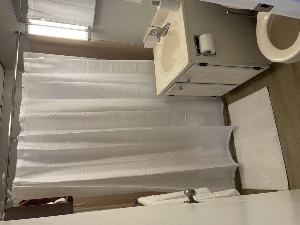 a roll of toilet paper on the wall of a bathroom