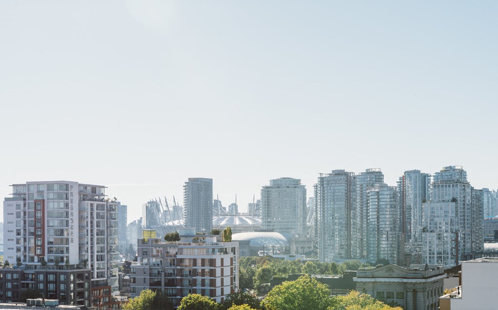 a view of the city from the roof of a building