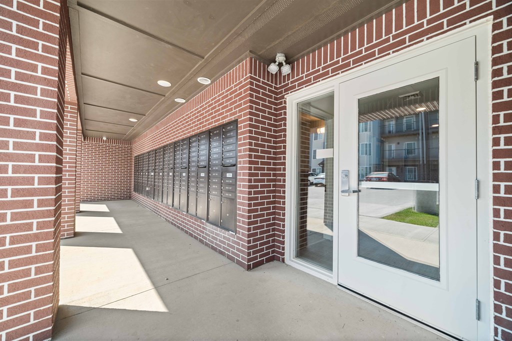 a brick building with a white door  at Union at Wiley, Iowa