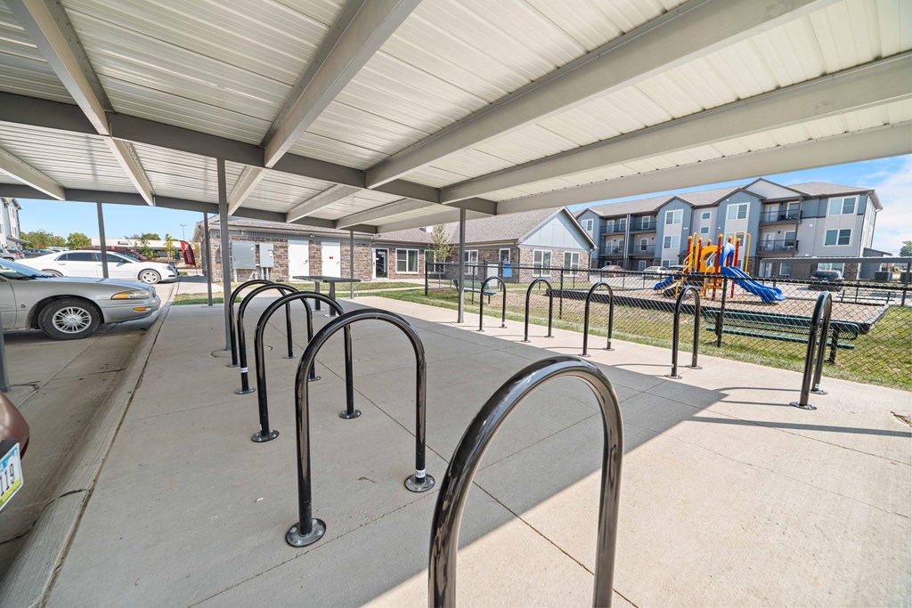 a playground at the whispering winds apartments in pearland, tx  at Union at Wiley, Cedar Rapids, Iowa