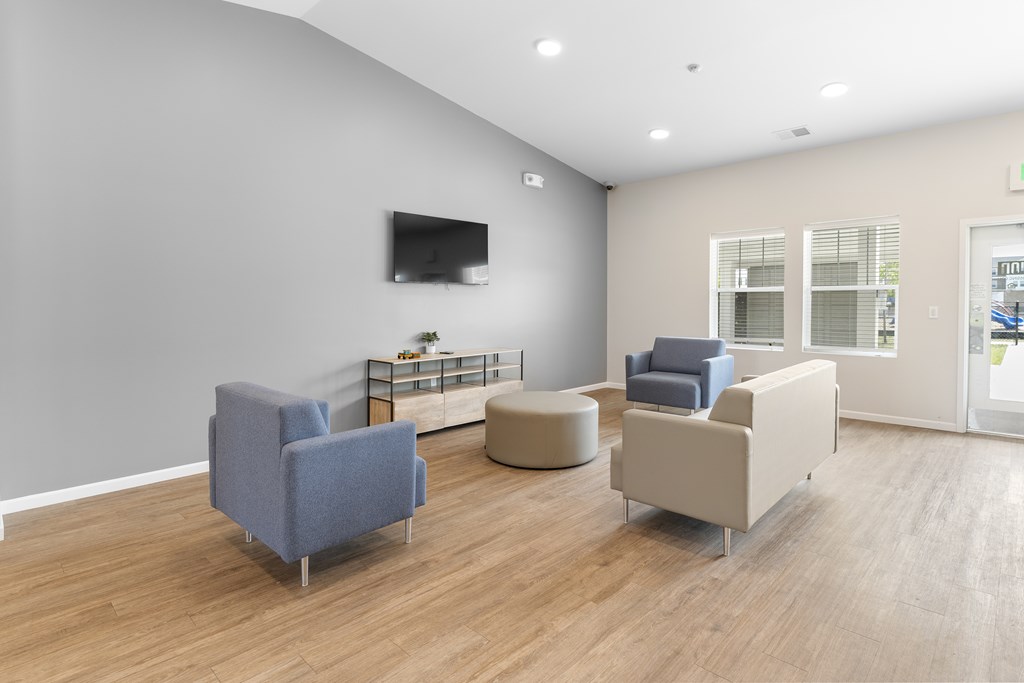 Living Room With TV at Union at North Crossing, Iowa