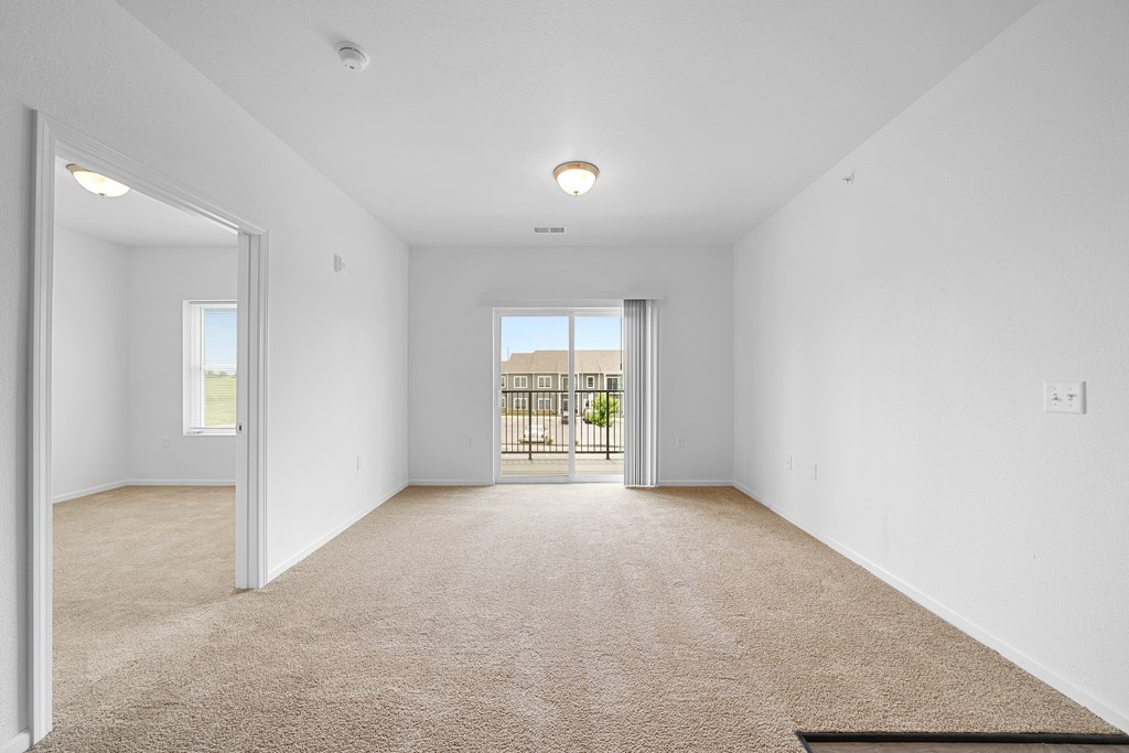 Carpeted Living Area at Union at the Loop, Lawrence