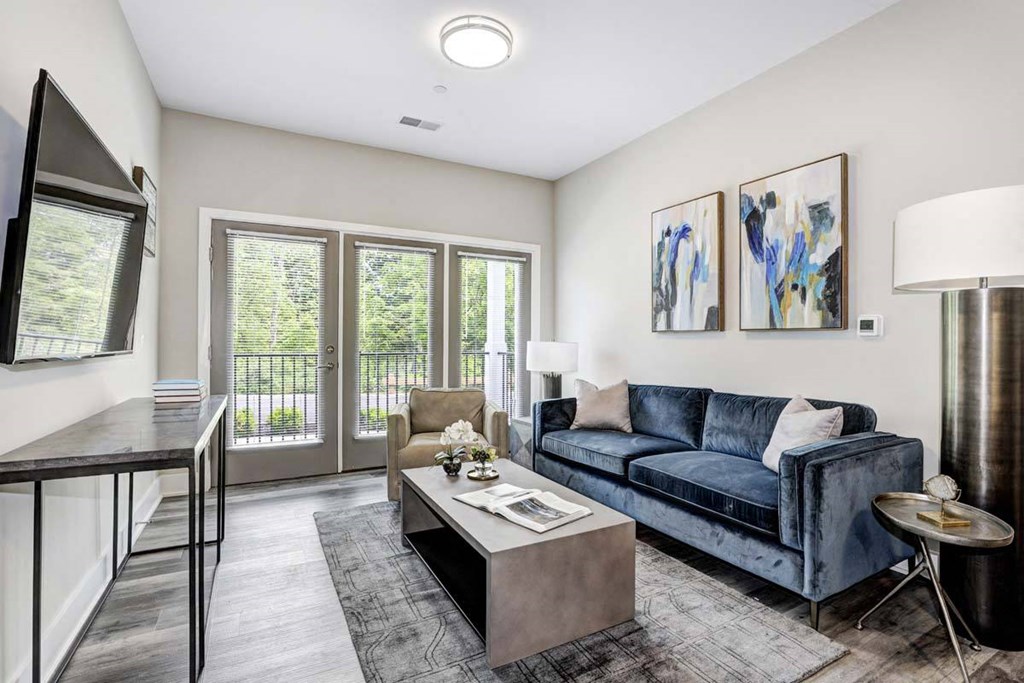 a living room with a couch and a table