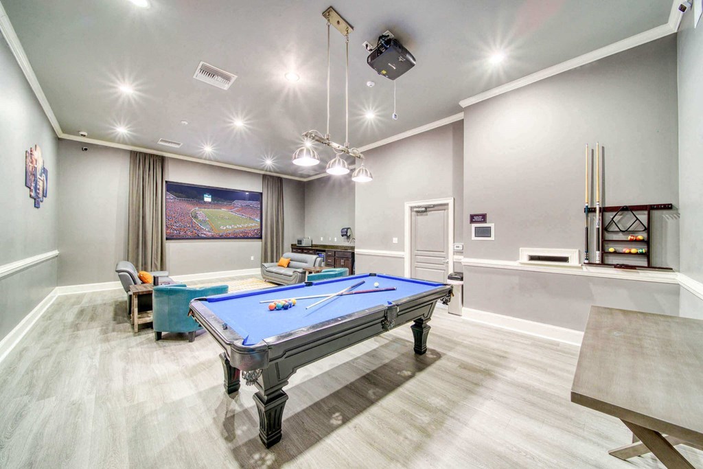 a games room with a pool table and HD projector at Meridian Obici, Suffolk, 23434