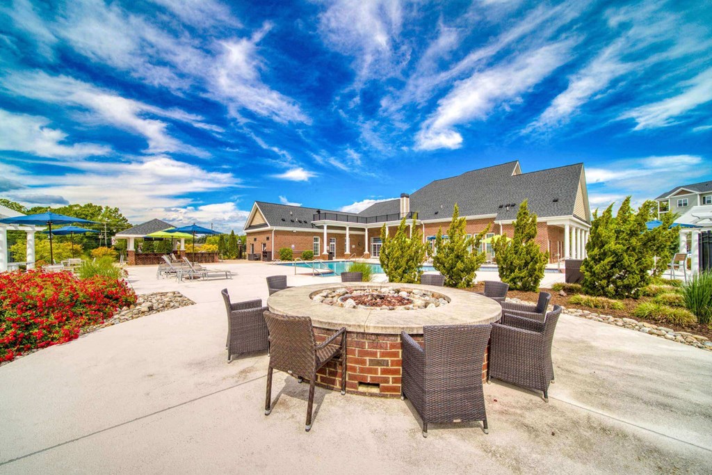 A large pool with a fire pit at Meridian Obici, Suffolk Virginia