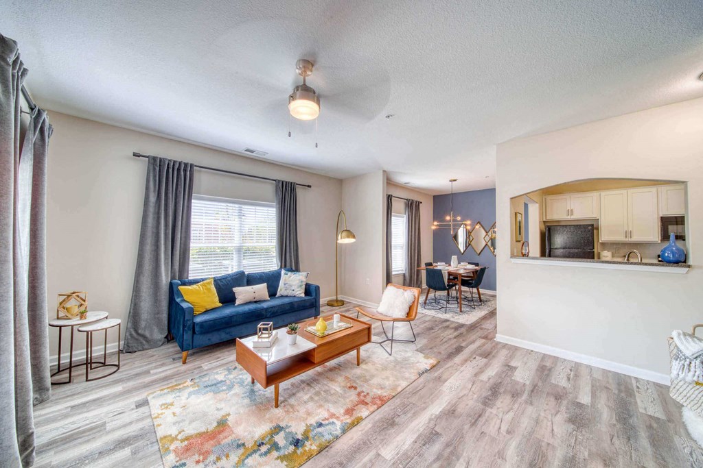 A spacious apartment living room at Meridian Obici, Suffolk, VA