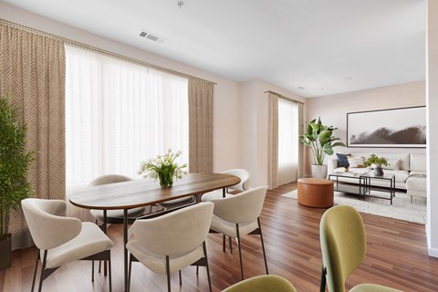 a dining room with a table and chairs a dining room with a table and chairs at West 130, West Hempstead, 11552