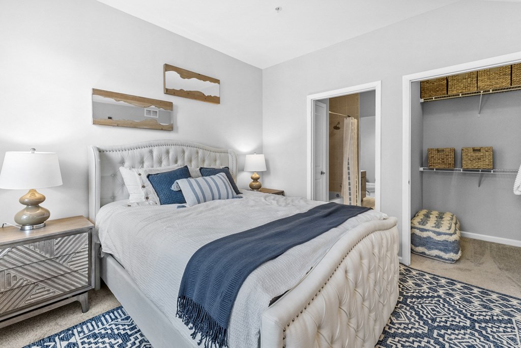 a bedroom with a bed and a closet  at Harbor Pointe, Bayonne, 07002