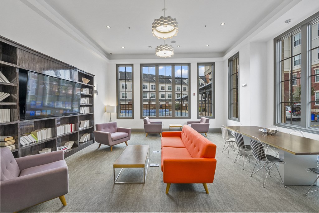 a view of the library with furniture and a large window at Harbor Pointe, Bayonne, 07002