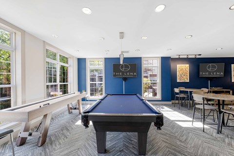 Game room with pool table and dining tables at The Lena Apartments, New Jersey