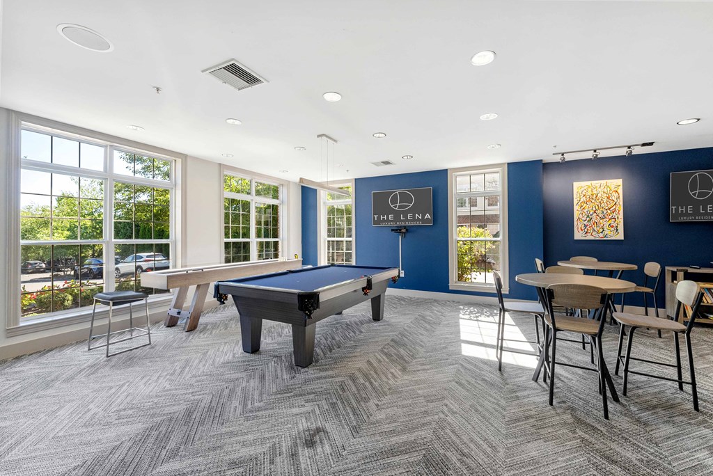 The Clubhouse with a pool and foosball table at The Lena in Raritan, NJ