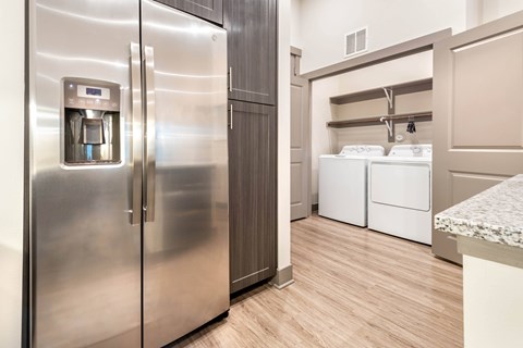 Kitchen and laundry at The Bridge at McKinney, McKinney Texas