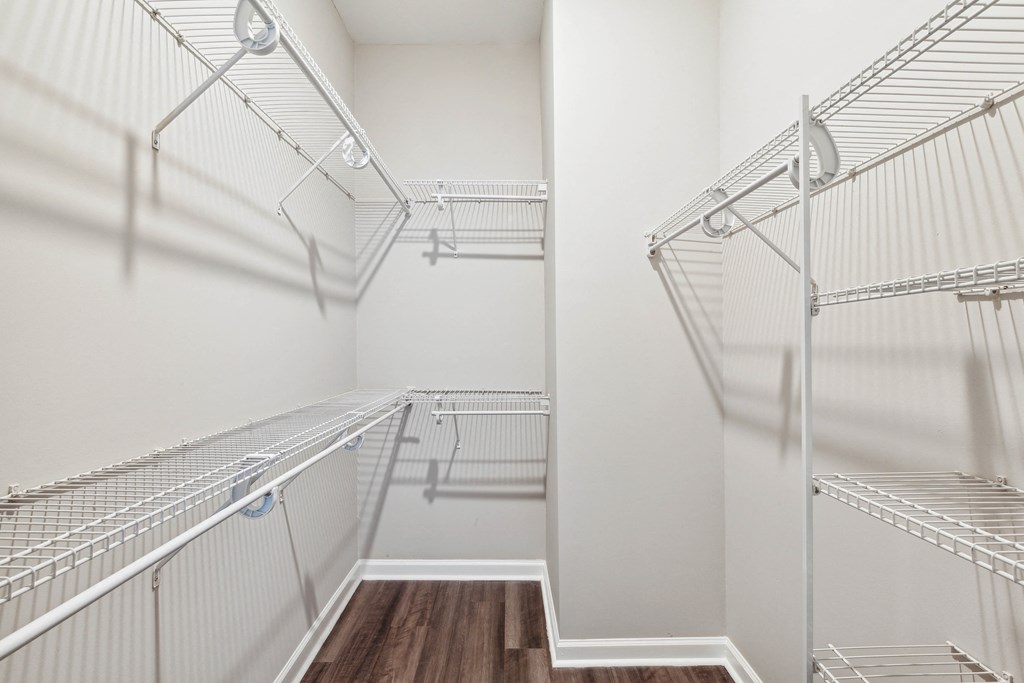 a spacious walk in closet with stainless steel shelves at Metro 303, Hempstead New York
